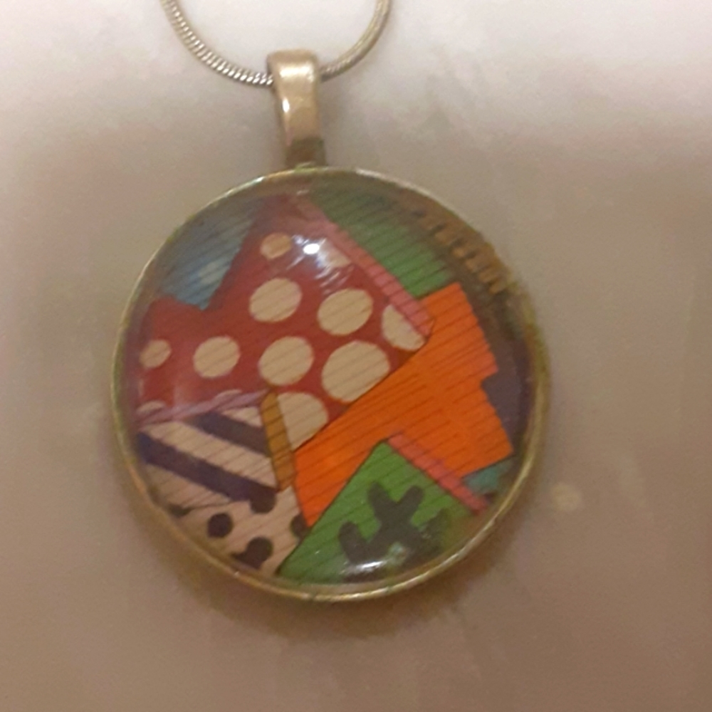 Print Circle design necklace on 18" metal snake chain.